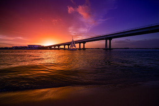 Sunset over a coastal bridge along Alabama’s Gulf Coast.